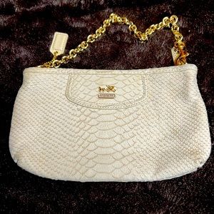 Coach wristlet faux python finish